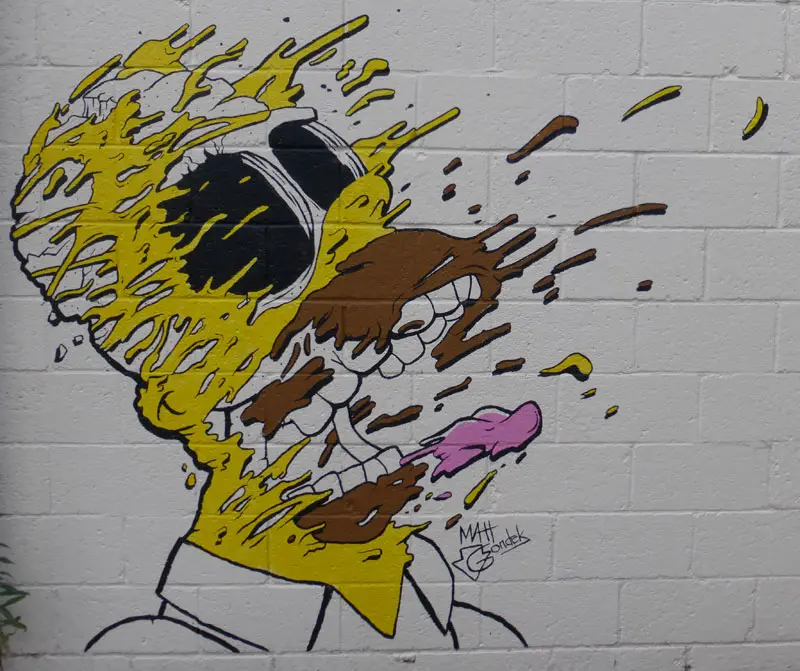 Graffitis de los Simpson- depellejandose